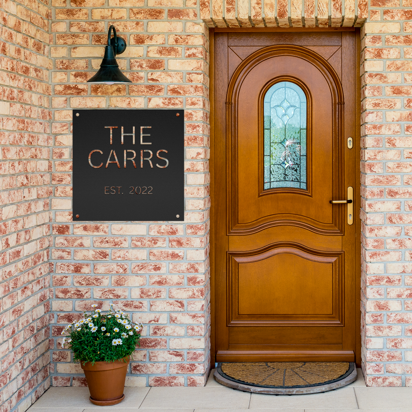 Personailized_Metal_Wall_Sign_Black_Brick_Entrance_Mockup.png